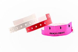 Custom 3-tab vinyl wristbands with detachable tabs for drink or meal tickets, shown with snap closure bands and printed tabbed style
