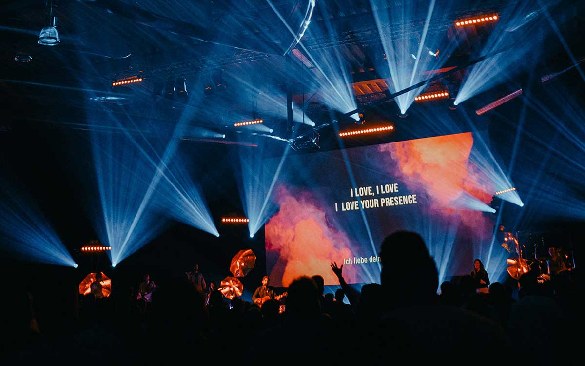 Crowd at a multi-day U.S. festival under stage lights, showing the type of event where multi-day wristbands support secure entry and VIP access