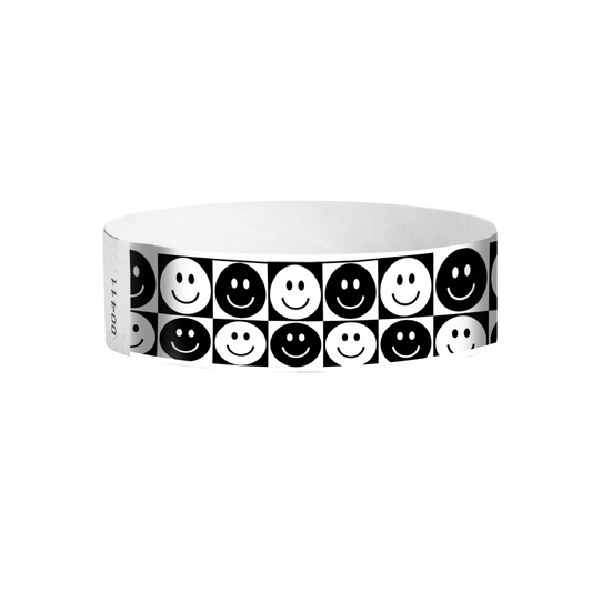 Checkered Happy Face Tyvek wristbands – black and white smiley pattern event wristbands