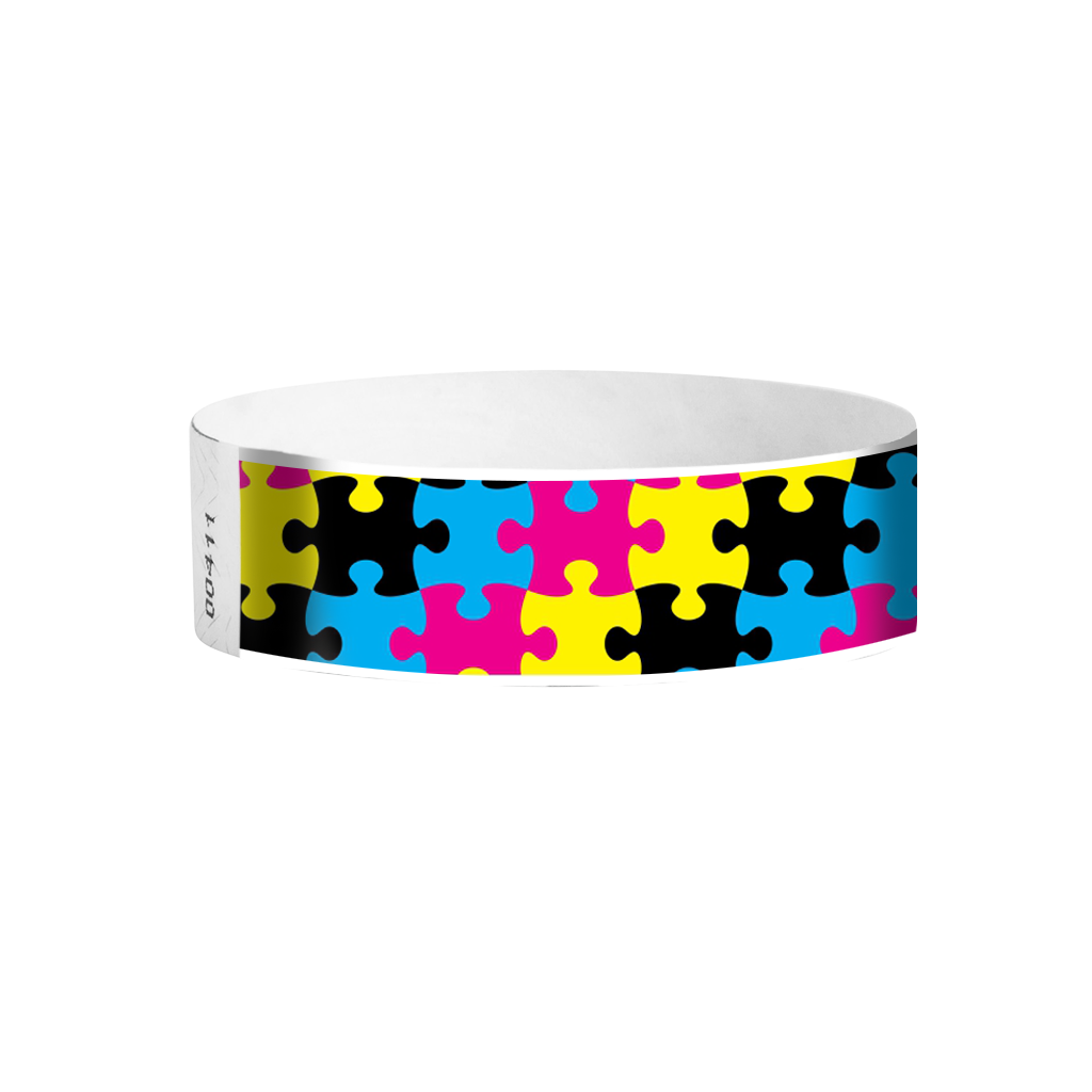Puzzle Tyvek wristbands – colourful puzzle-piece patterned wristbands for kids’ events and parties