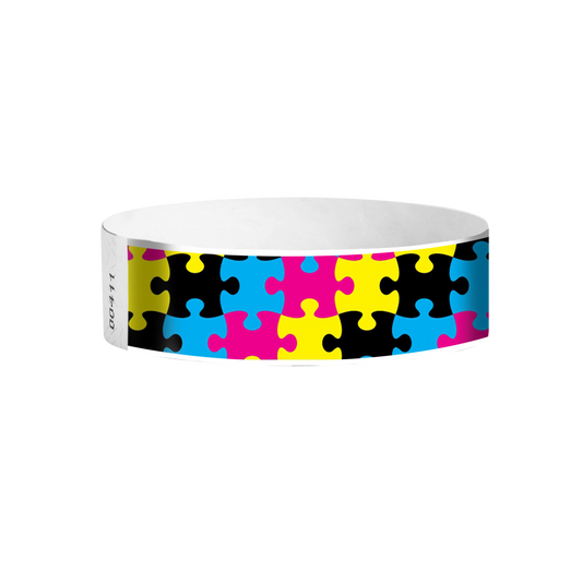 Puzzle Tyvek wristbands – colourful puzzle-piece patterned wristbands for kids’ events and parties