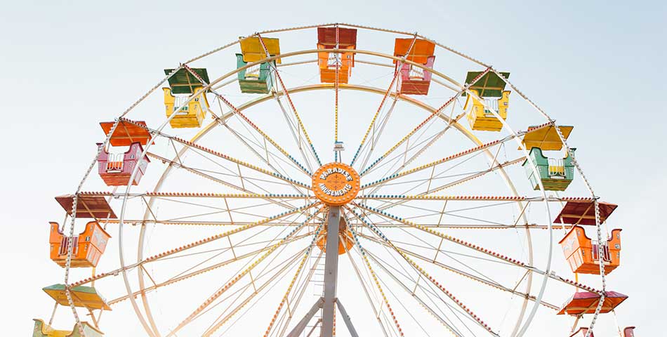 Ferris wheel at amusement park entrance banner for event wristbands and fast admission control